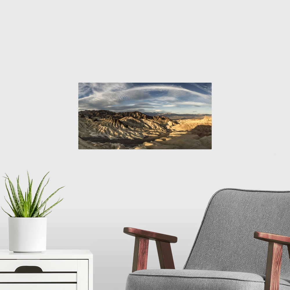 A modern room featuring Zabriski Point panorama in Death Valley at sunrise.