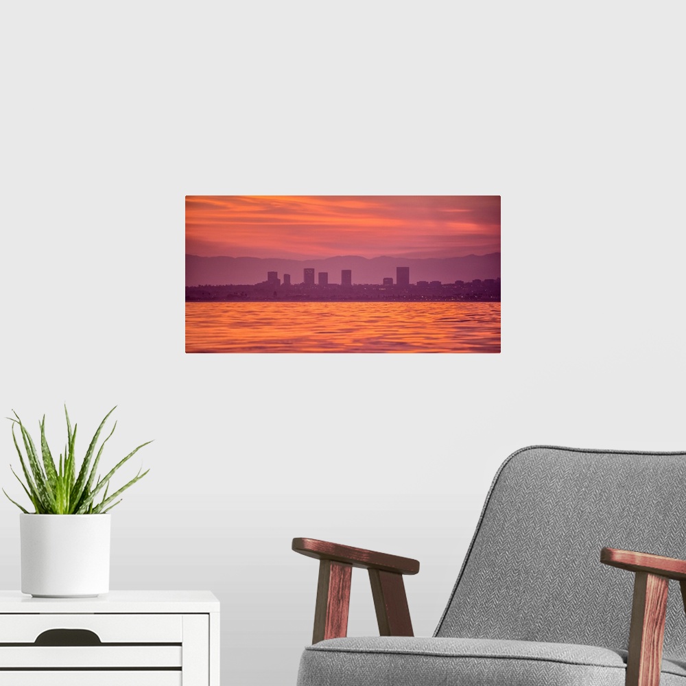 A modern room featuring Newport Beach, CA. Sunrise over Newport beach, California.