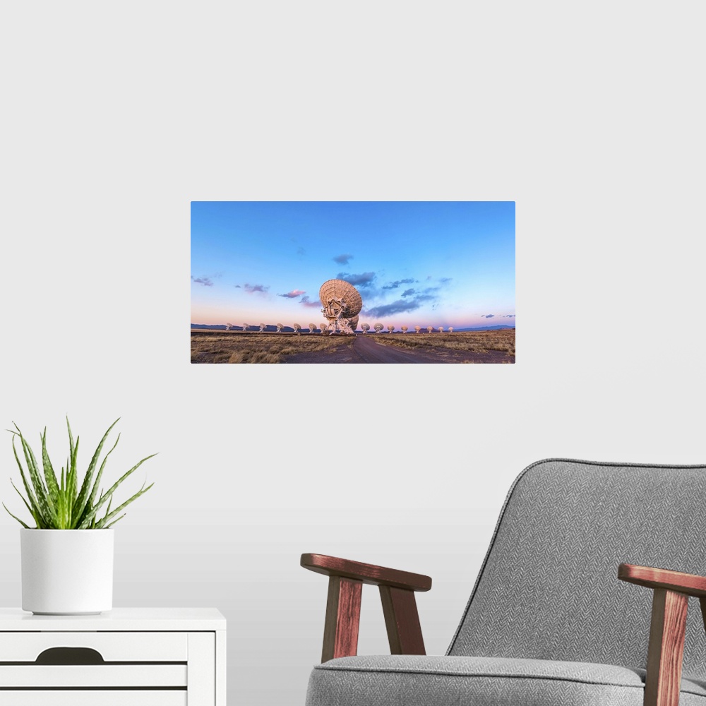A modern room featuring March 17, 2013 - The Very Large Array (VLA) radio telescope in New Mexico at sunset. The Earth's ...