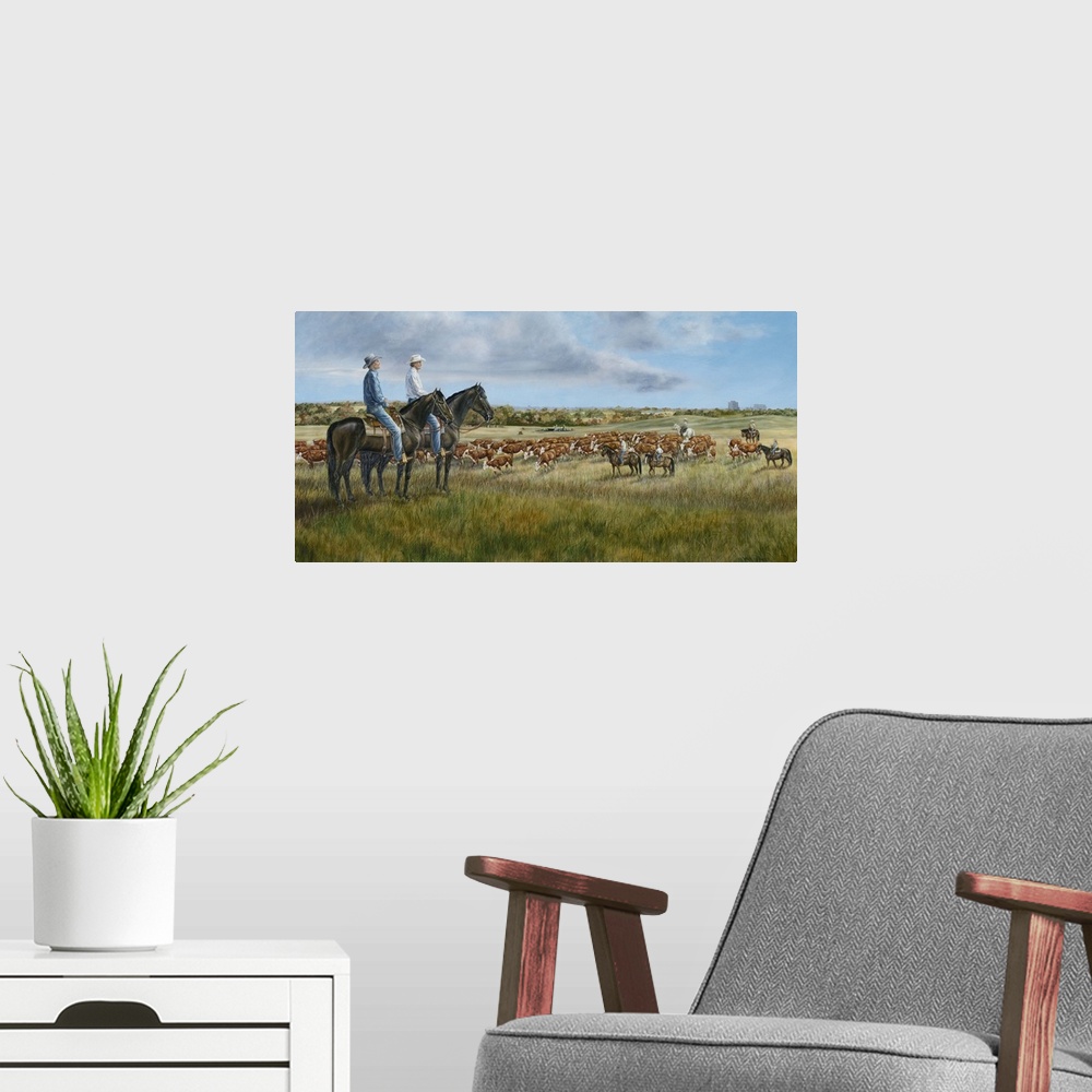 A modern room featuring Contemporary painting of cowboys sitting atop their horses overlooking their herd.