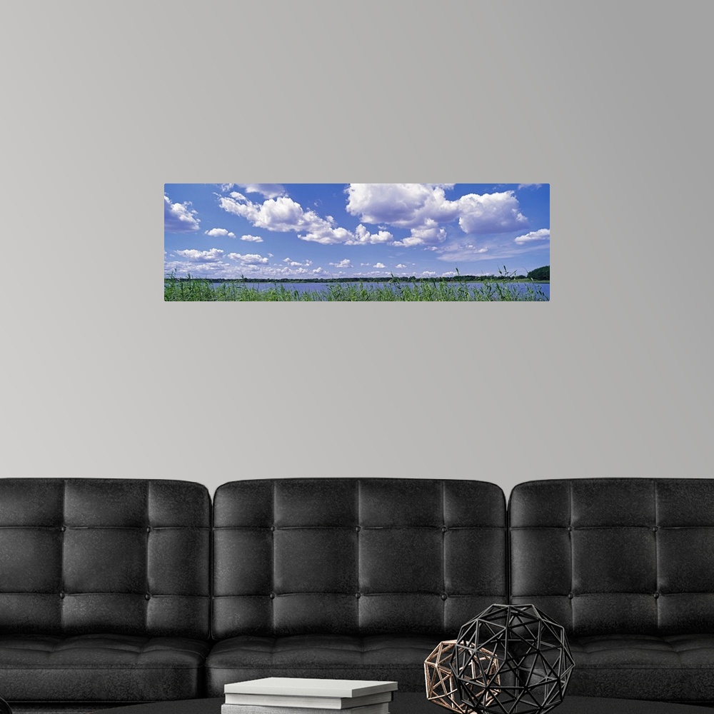 A modern room featuring Clouds Lake Schleswig-Holstein Germany