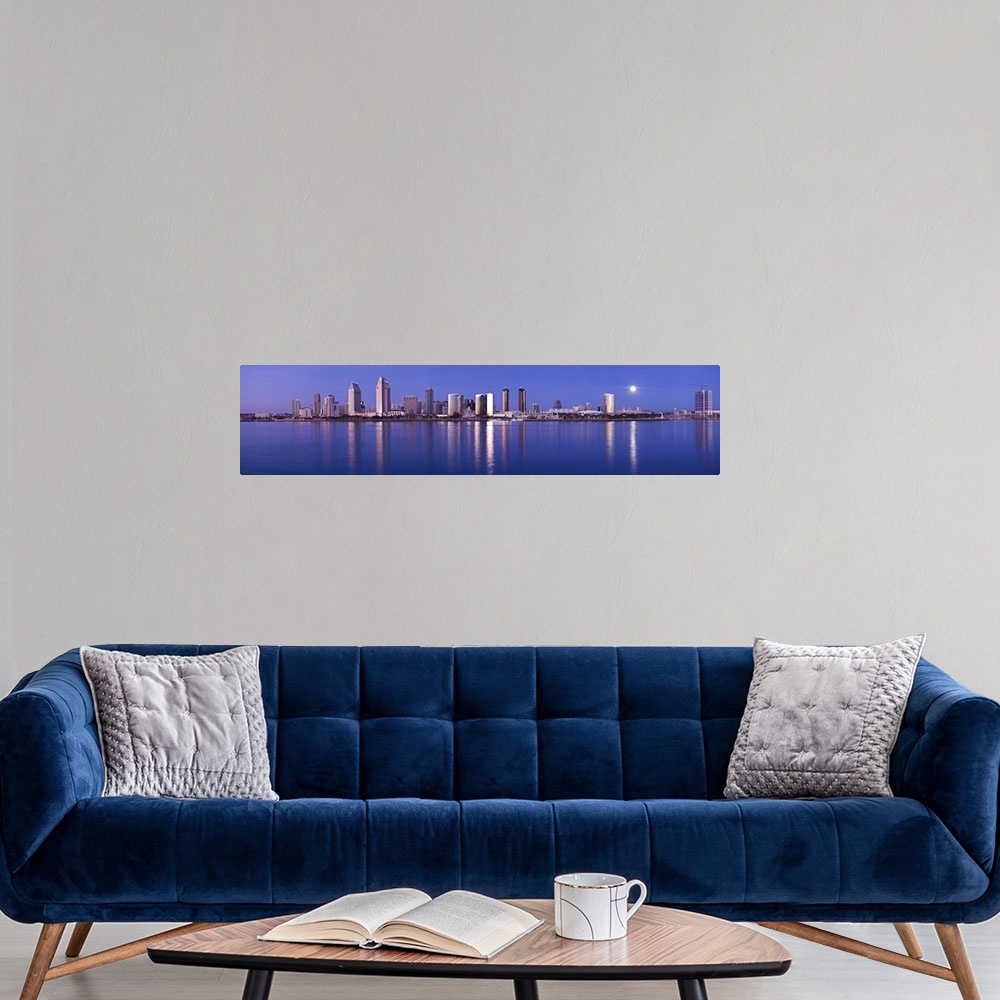 A modern room featuring Moonrise over a city San Diego California