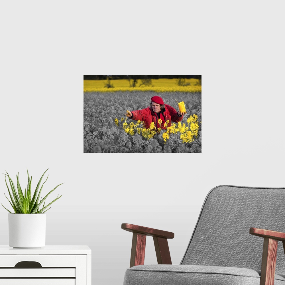 A modern room featuring Conceptual image of an artist painting a field of flowers yellow.