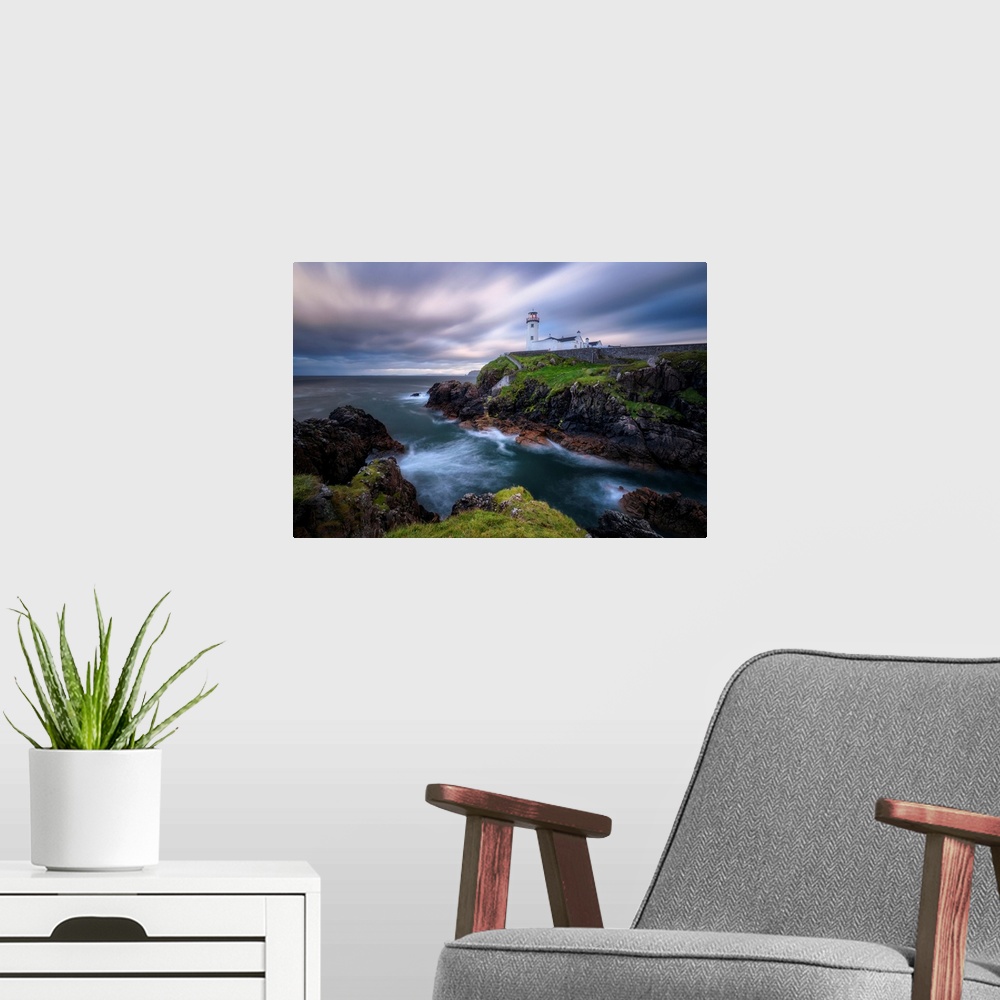 A modern room featuring Fanad Head Lighthouse