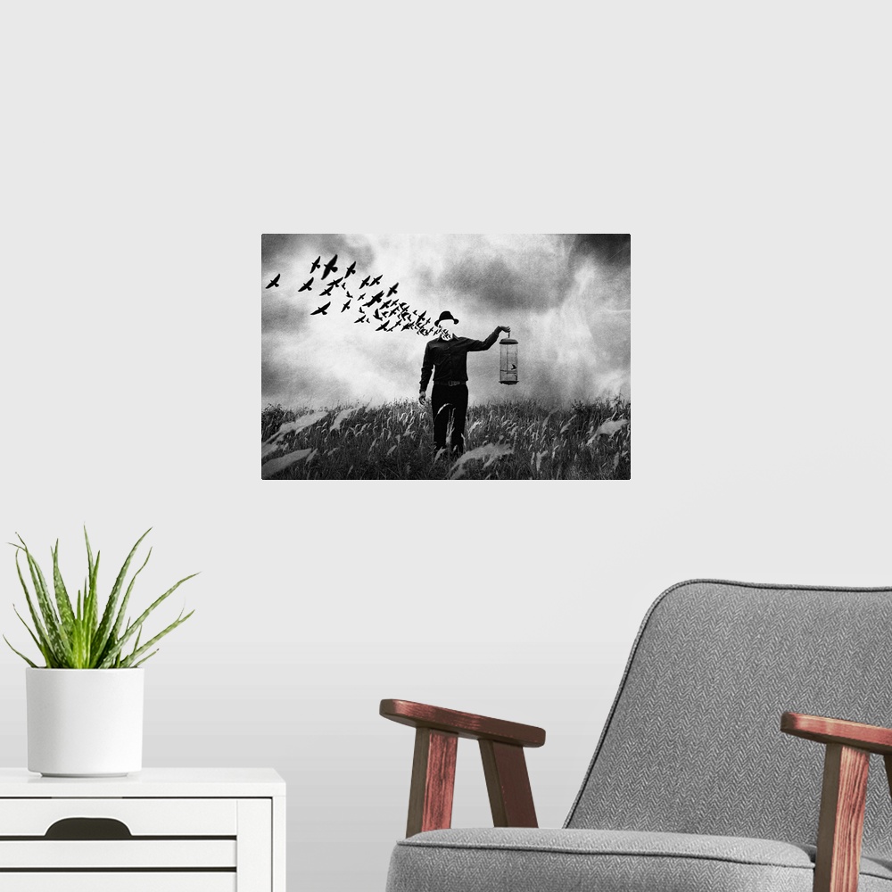 A modern room featuring Conceptual photograph of a man standing in a field holding a bird cage with his face dematerializ...