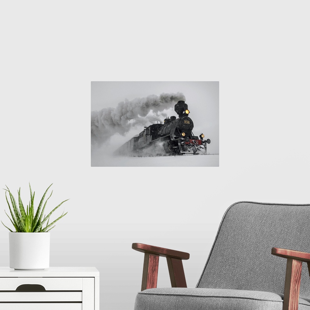 A modern room featuring A powerful locomotive races through the snowy landscape in the desert, leaving billowing steam be...