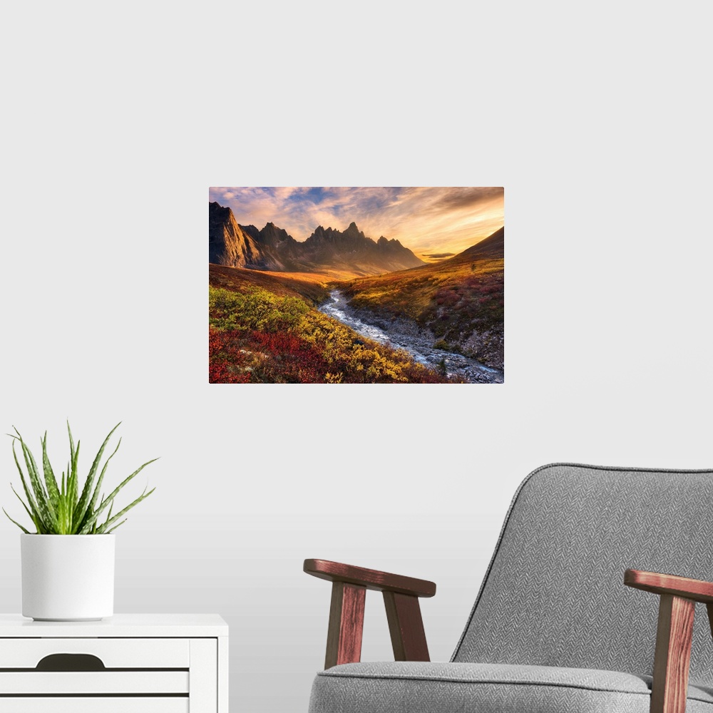 A modern room featuring Beautiful sunset light and colorful tundra looking toward Tombstone Mountain during Autumn in the...