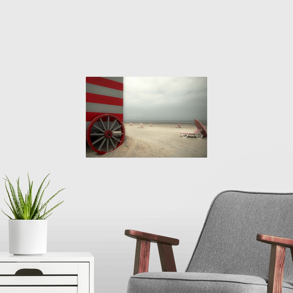 A modern room featuring Beach scene with umbrellas and a red striped beach hut.