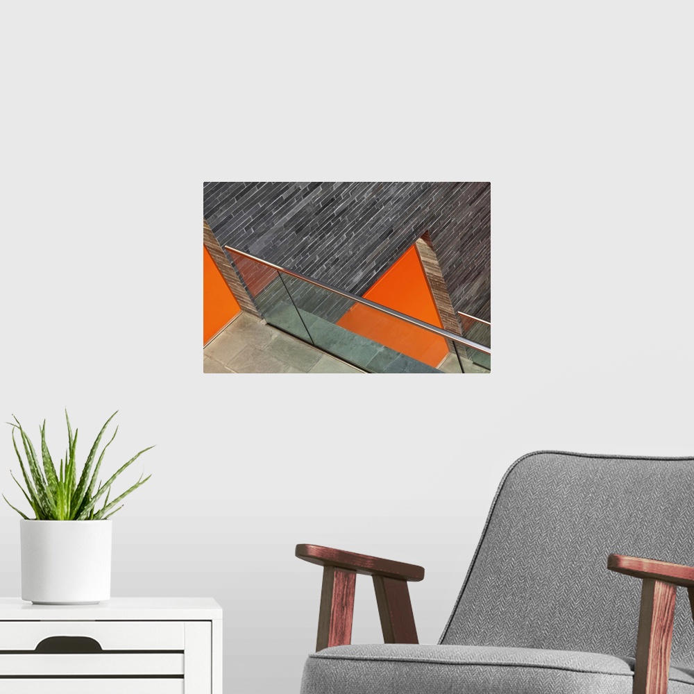 A modern room featuring Abstract image of the brick walls and orange floors of a museum in Hilversum, Netherlands.