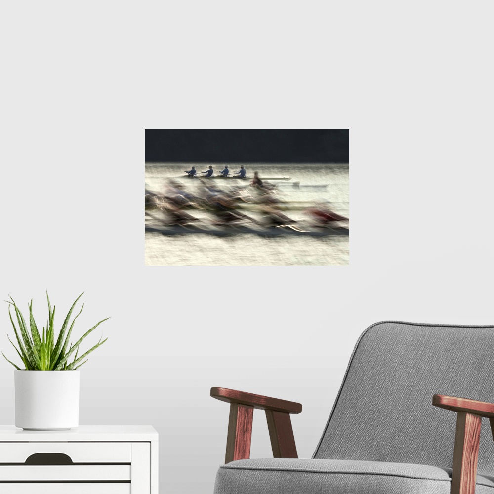 A modern room featuring Long exposure photograph of rowing teams in a lake.