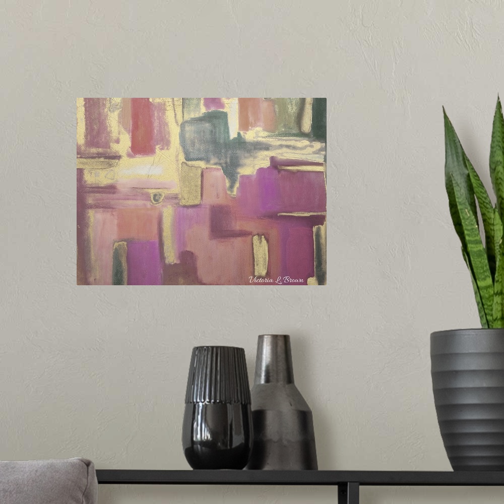 A modern room featuring Contemporary abstract home decor artwork using tones of pink and gold.