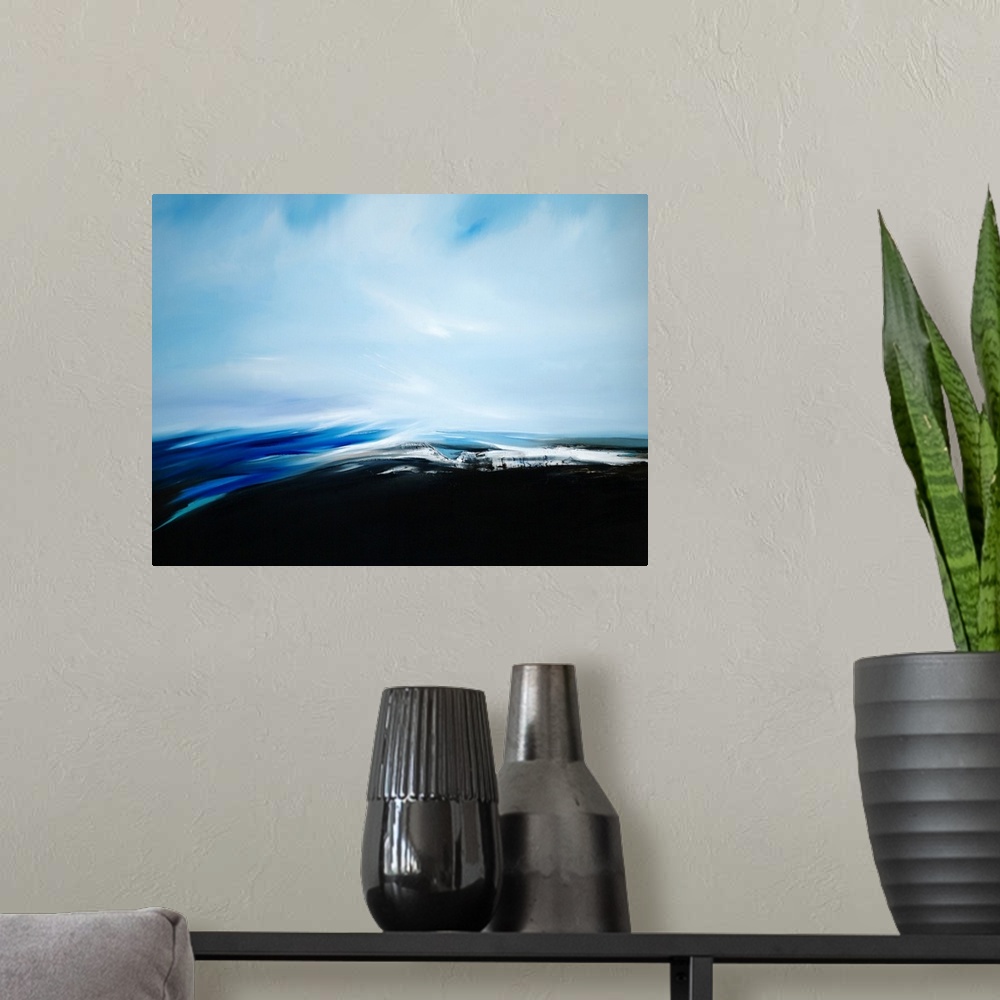 A modern room featuring A seascape with stark contrast between the dark see and light sky.