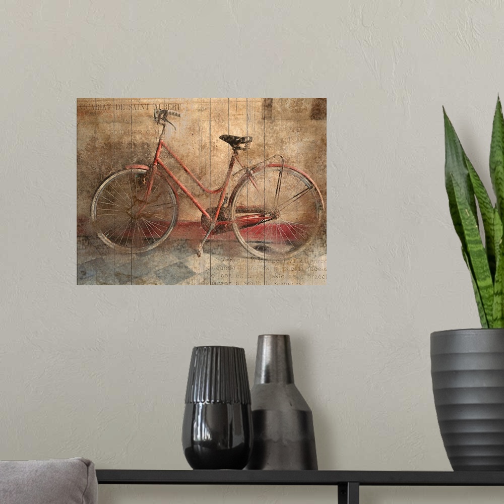 A modern room featuring An old bicycle leaning against a wall in low light.