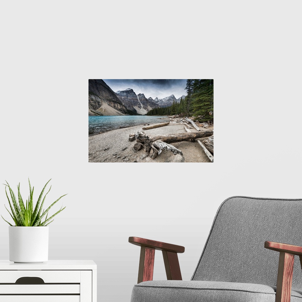 A modern room featuring Moraine Lake is a glacially-fed lake in Banff National Park, 14 kilometres (8.7 mi) outside the V...