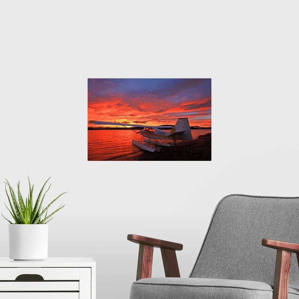 A modern room featuring A Float Plane Facing The Sunrise Over Teslin Lake, Yukon, Canada