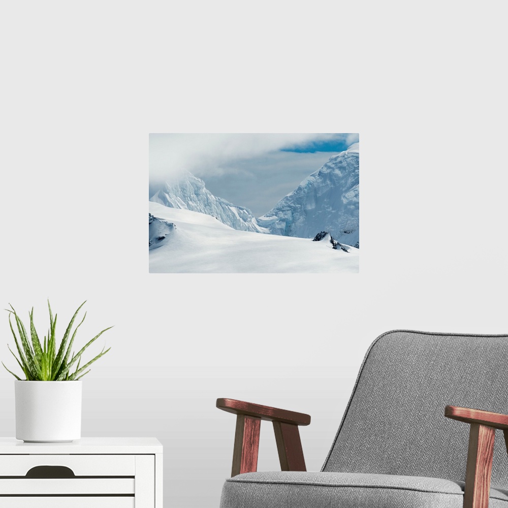 A modern room featuring Antarctic mountains, Antarctica.