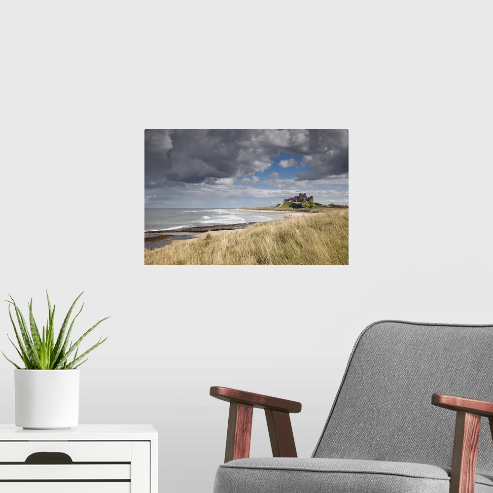 A modern room featuring Bamburgh Castle; Northumberland, England