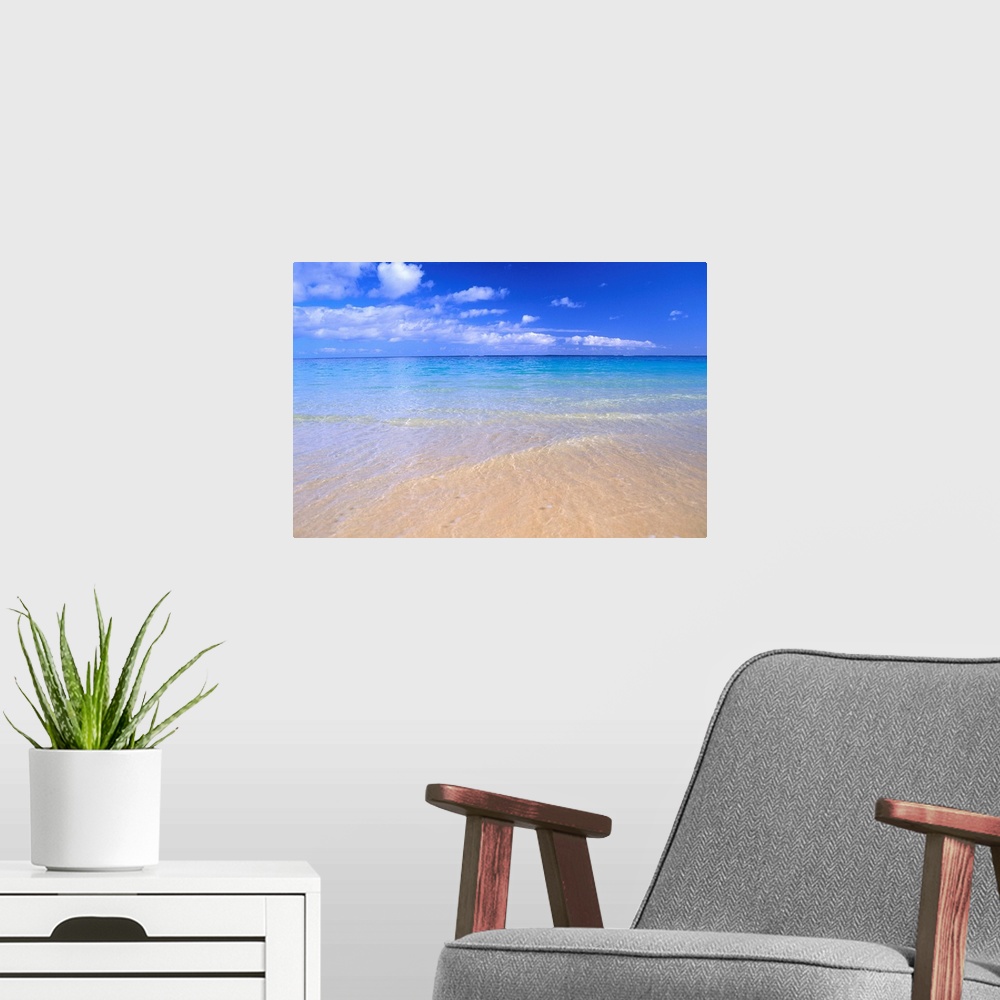 A modern room featuring Blue Sky With Clouds, Calm Shoreline, Turquoise Water On Horizon