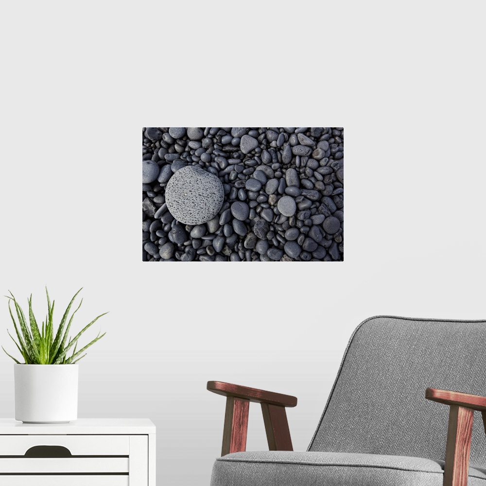 A modern room featuring Close-up of smooth rocks on a beach, Iceland