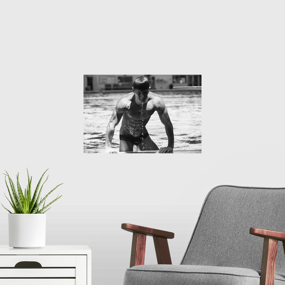 A modern room featuring Diver Pulling Himself Out Of Pool With Water Dripping Off Him, Oregon, USA