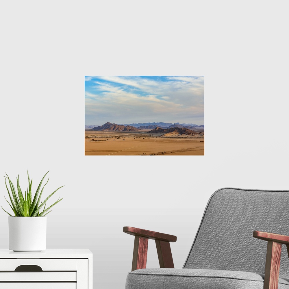 A modern room featuring Elim dune, Sesriem, Namib-Naukluft National Park, Namib Desert; Namibia.