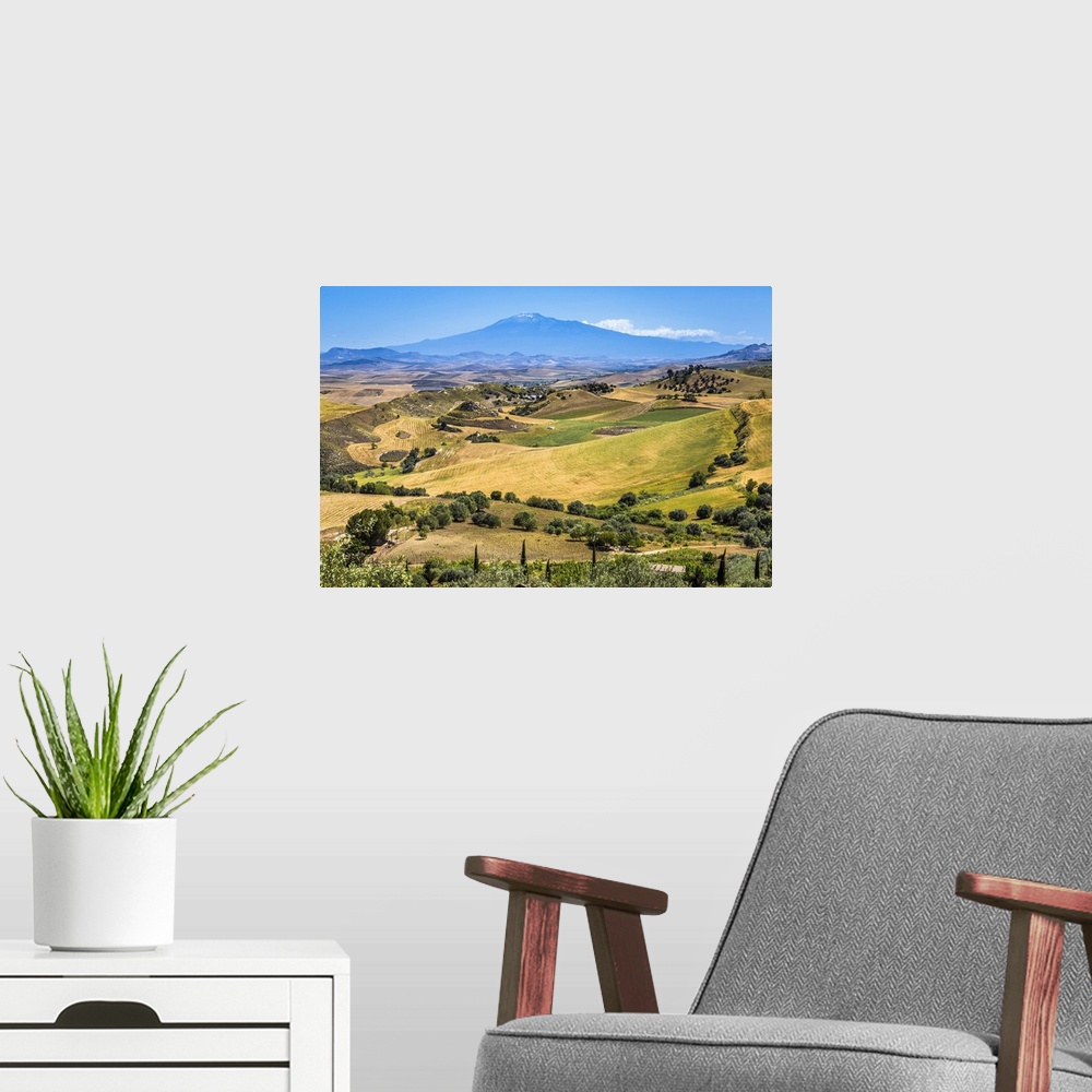 A modern room featuring Farmland with Mount Etna in the background near San Michele di Ganzaria, Sicily, Italy