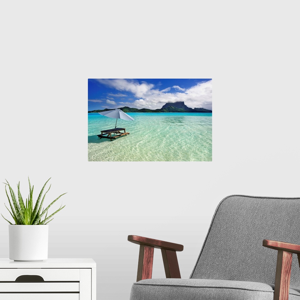 A modern room featuring French Polynesia, Tahiti, Bora Bora, Picnic Table And Umbrella In Clear Lagoon Water