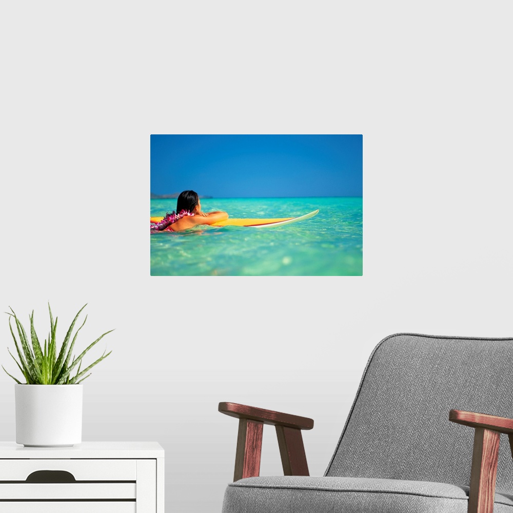 A modern room featuring Hawaii, Oahu, Lanikai, Woman Resting On Surfboard Looking Out On Clear Teal Water