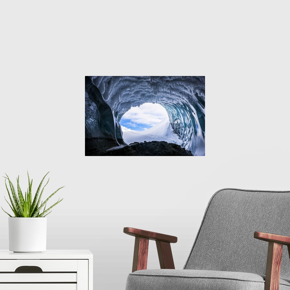 A modern room featuring Hoarfrost hangs from the ceiling of a Canwell Glacier ice cave in winter; Alaska, USA