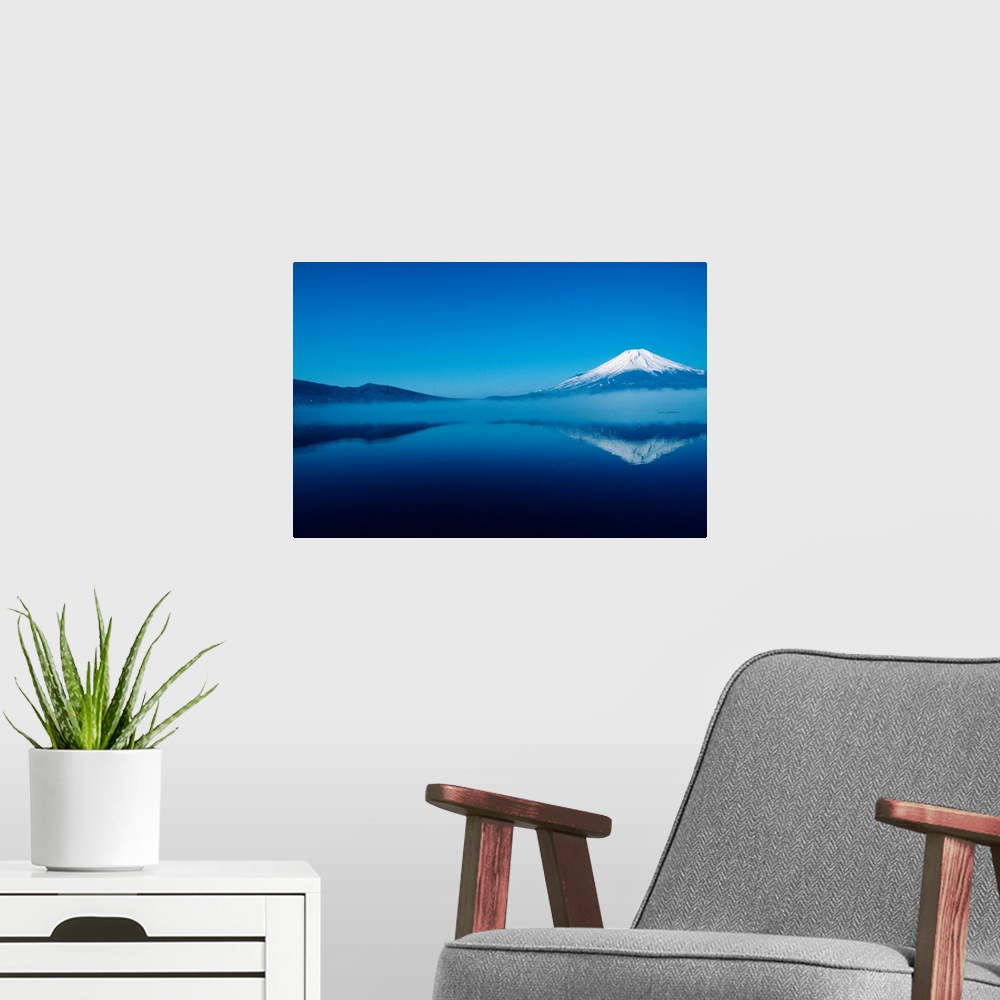 A modern room featuring Japan, Mount Fuji, Lake Motosu, misty reflection of snowcapped mountain