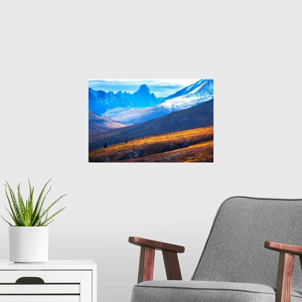 A modern room featuring The north Klondike valley lights up along the Dempster Highway with Tombstone mountain in the dis...