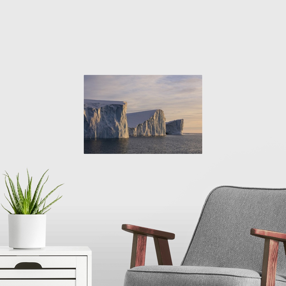 A modern room featuring Late afternoon sunlight on icebergs in Disko Bay.