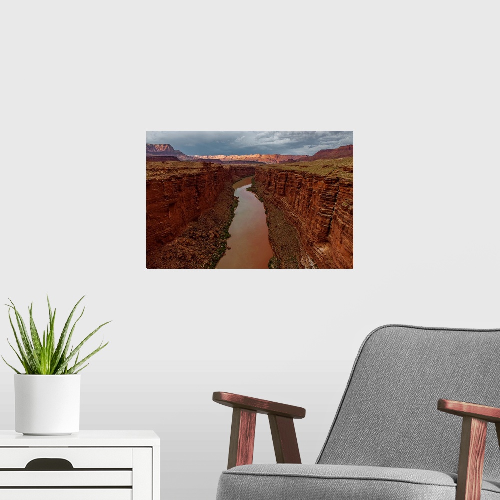 A modern room featuring Looking on Lees Ferry and the canyon walls on the Colorado River, the beginning of the Grand Cany...