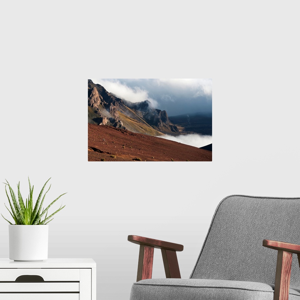 A modern room featuring Morning clouds begin to burn off of Haleakala National Park; Maui, Hawaii, United States of America