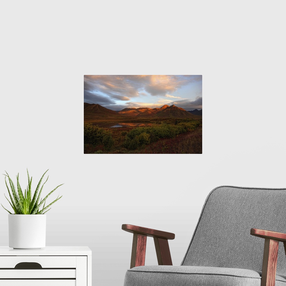 A modern room featuring Morning Sunlight Lighting Up Mount Adney And Fall Colours Along The Dempster Highway, Yukon
