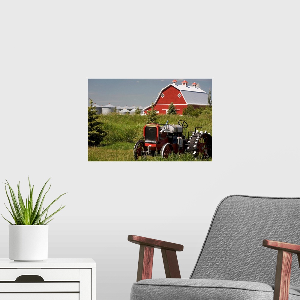 A modern room featuring Old Red Tractor In A Field With A Red Barn In The Background, Alberta, Canada
