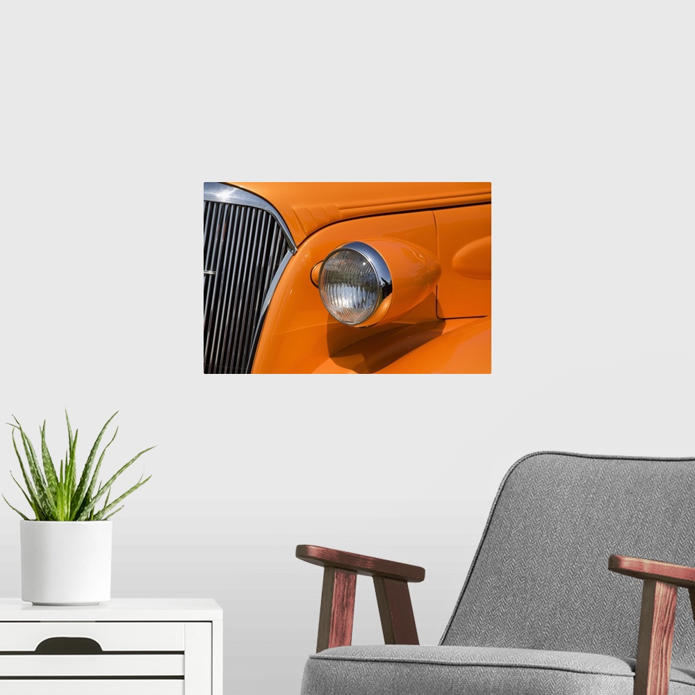 A modern room featuring Orange Painted Vintage Car's Headlight And Front Grill; Port Colborne, Ontario, Canada