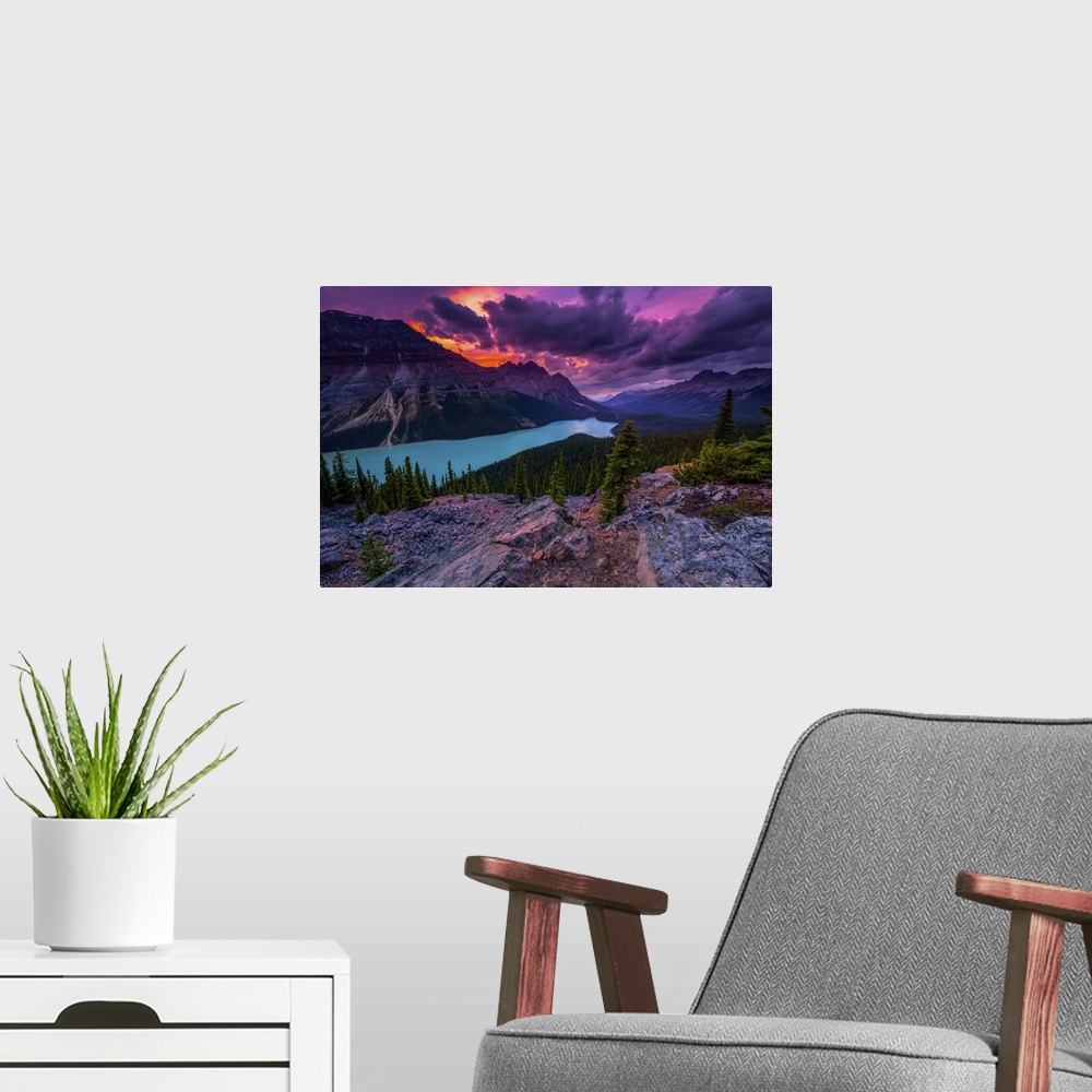 A modern room featuring Peyto Lake under dramatic skies, Banff National Park; Alberta, Canada