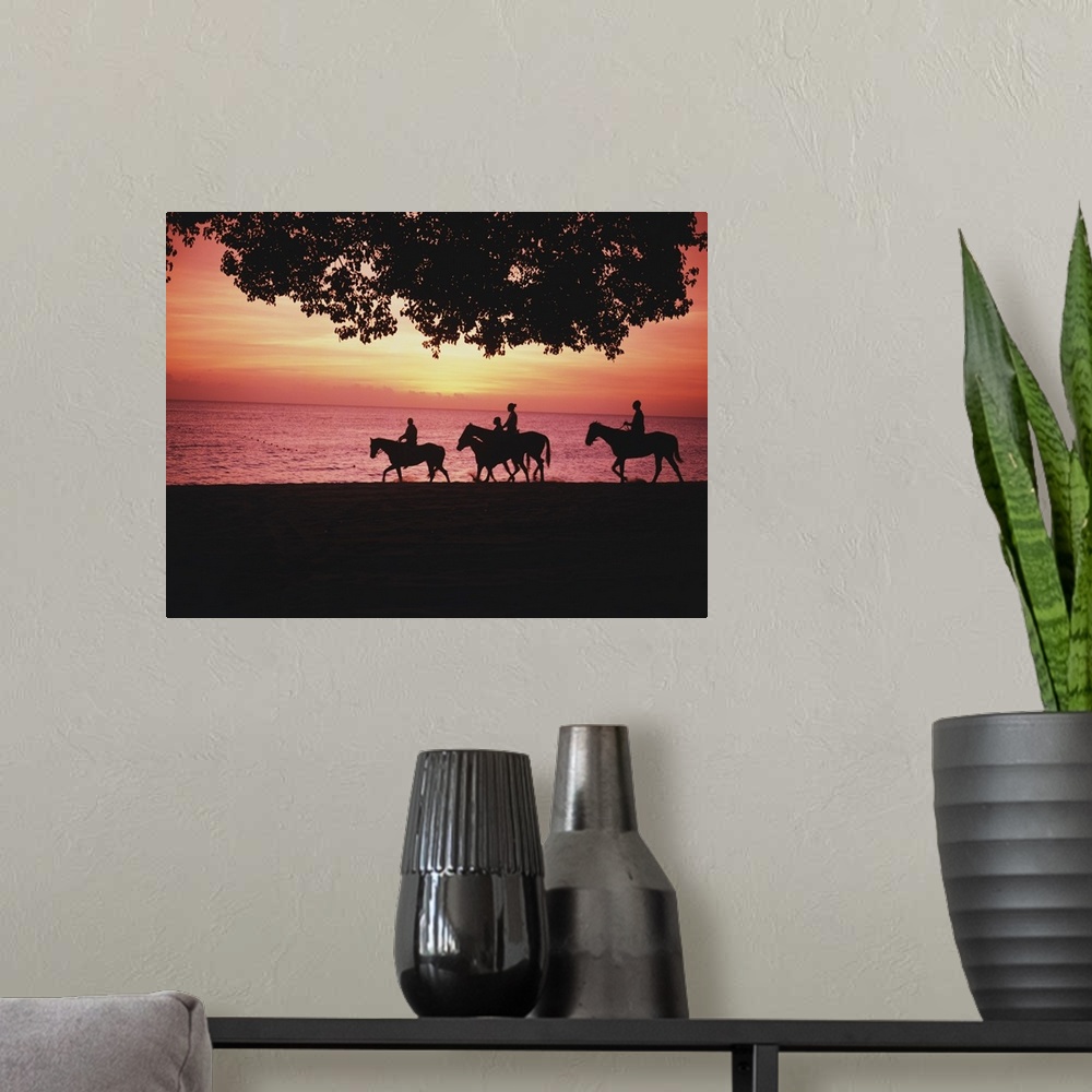 A modern room featuring Riding Horses On The Beach At Sunset