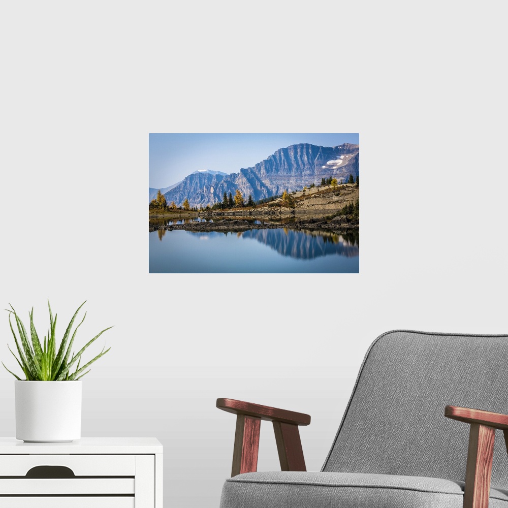 A modern room featuring Rock Isle Lake in Autumn with Mountain Range in Background, Mount Assiniboine Provincial Park, Br...