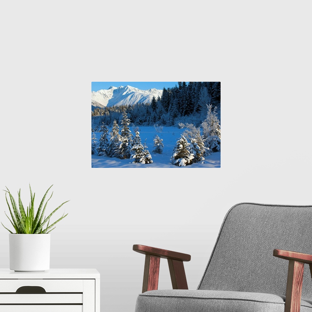 A modern room featuring Scenic view of Chugach Mountains and snowcovered landscape, Southcentral Alaska, Winter