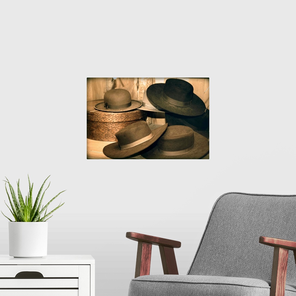A modern room featuring Selection Of Old-Fashioned Hats In Sepia Tones