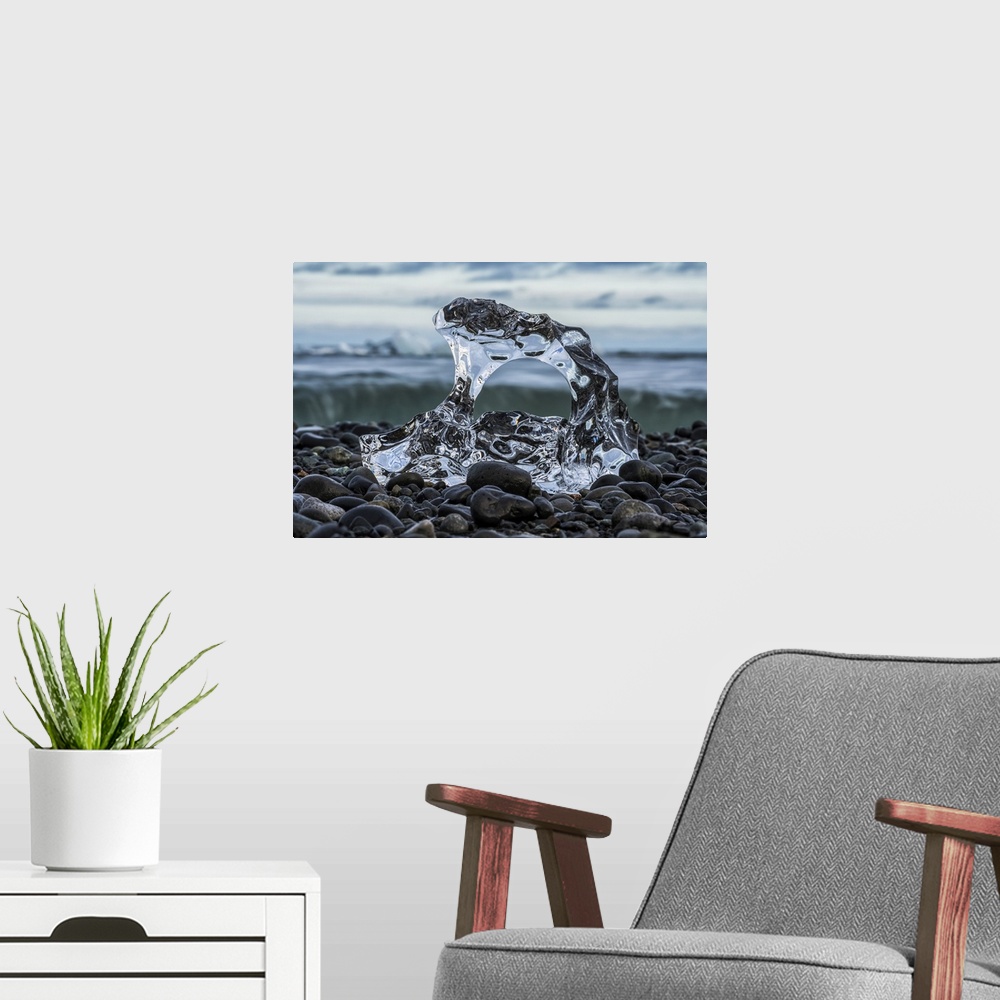 A modern room featuring Small piece of melted glacial ice on the shore of the ocean near Jokulsarlon, South Coast of Icel...