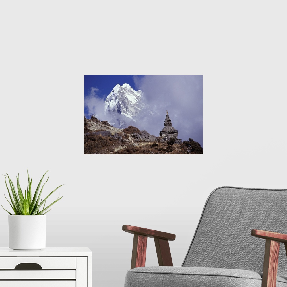 A modern room featuring Snow Covered Peak With Nepalese Monument