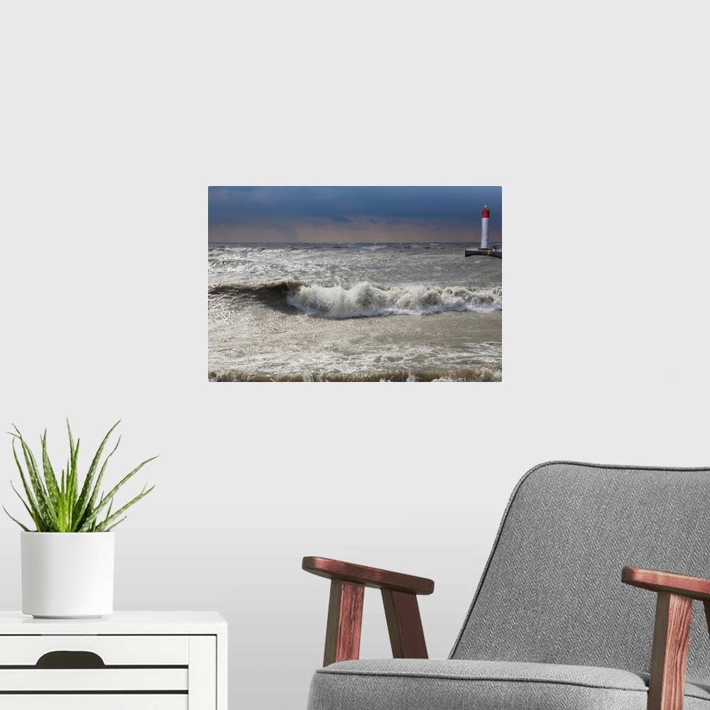 A modern room featuring Storm waves crashing on a beach near a lighthouse on Lake Ontario, Whitby, Ontario