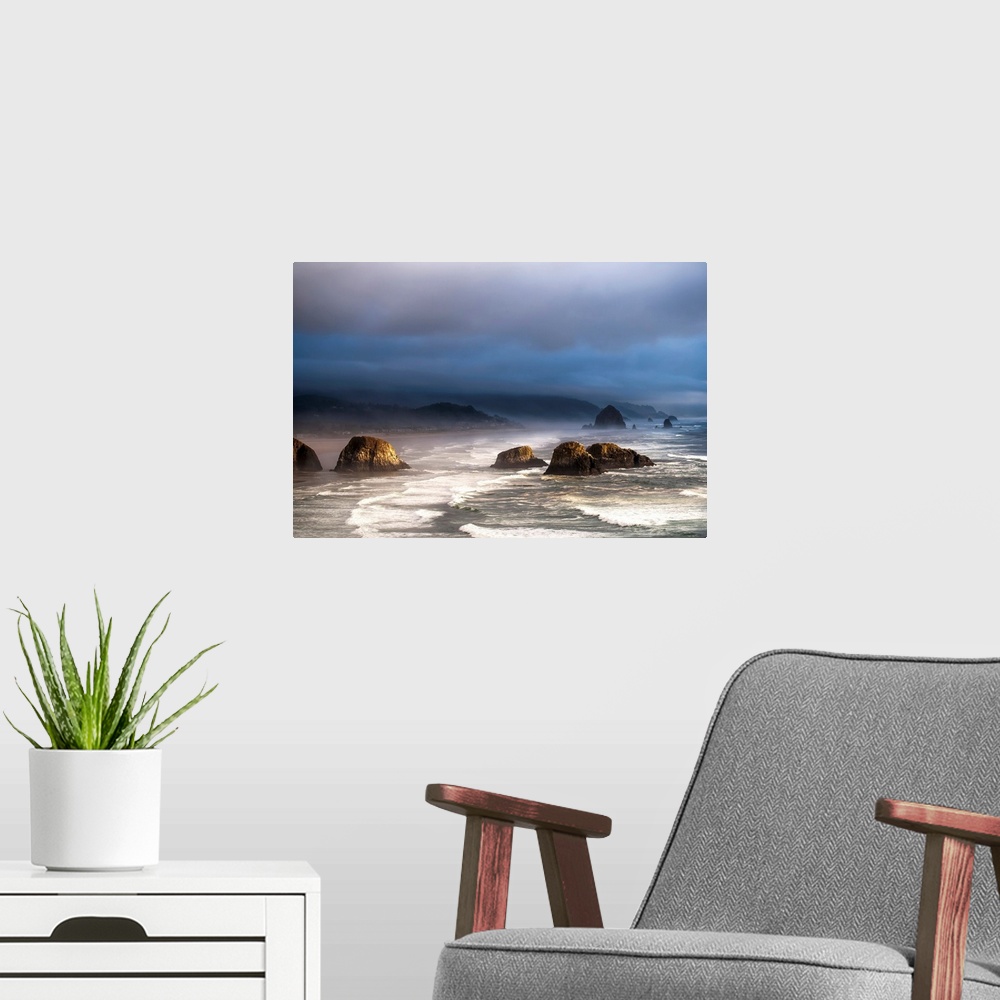 A modern room featuring Sunlight and mist create coastal moods. Cannon Beach, Oregon, United States of America.