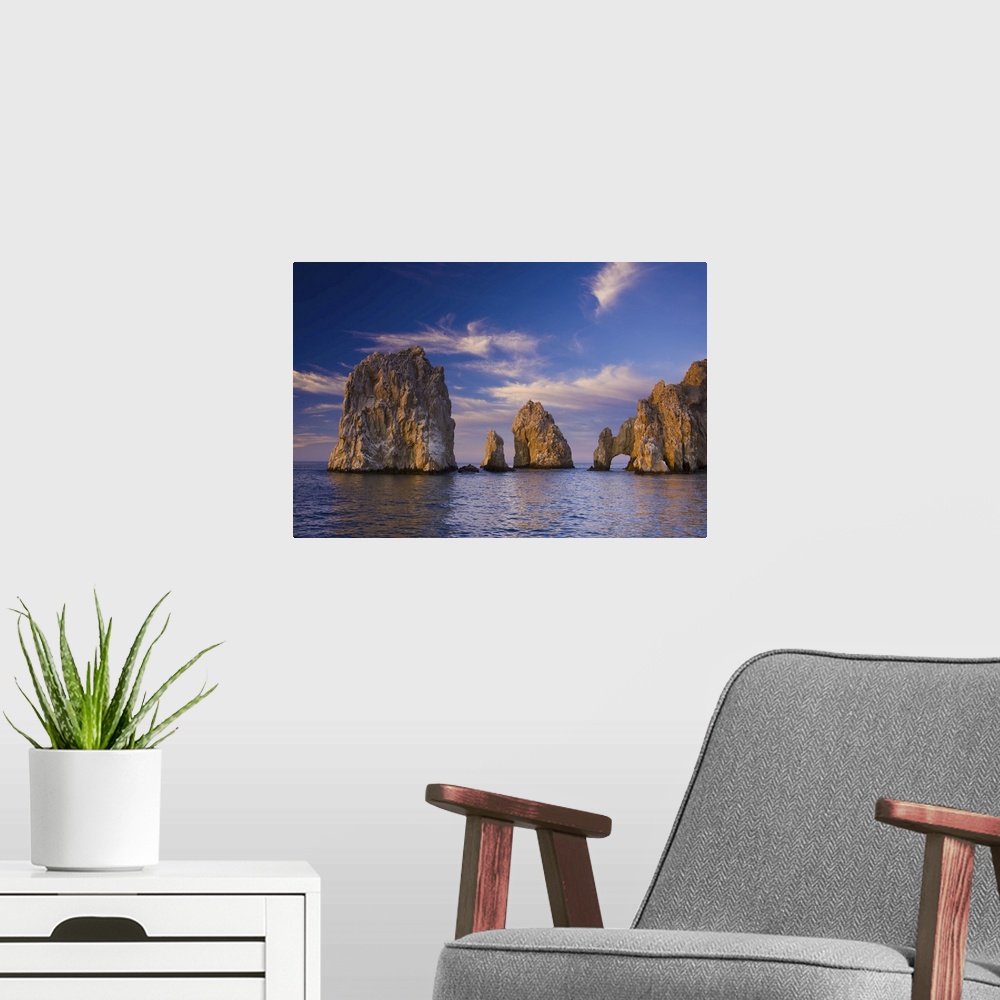 A modern room featuring Sunrise on Land's End, Los Arcos rock formations.
