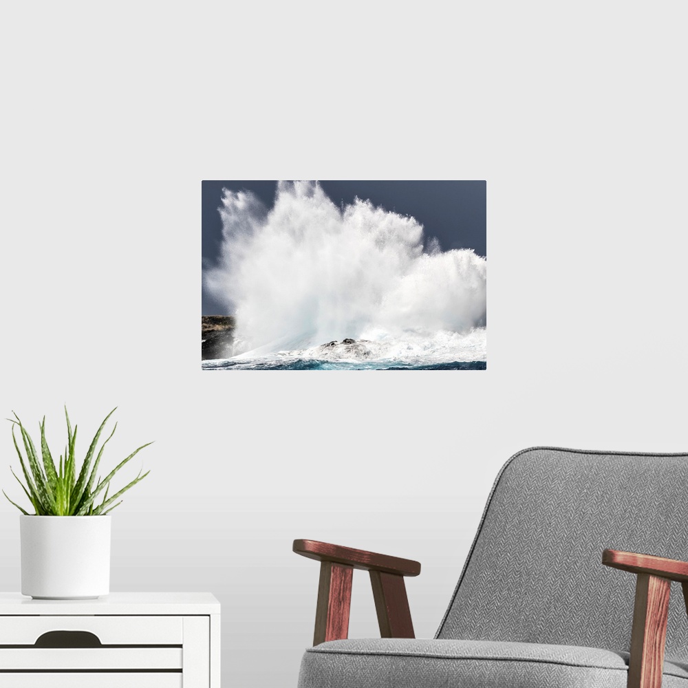 A modern room featuring Swell induced wave crashing on the Kona coast, Kona, Island of Hawaii, Hawaii, United States of A...