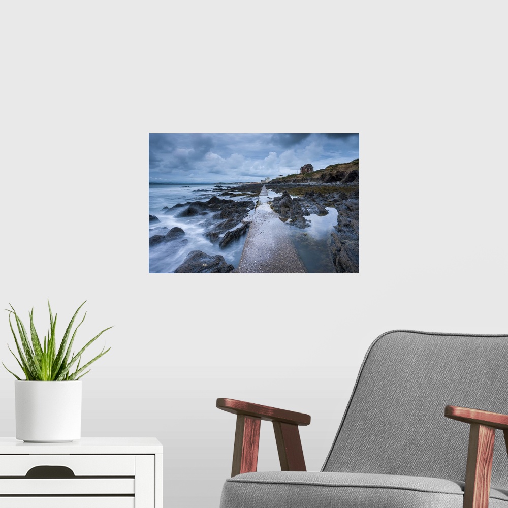 A modern room featuring The rocky shore at Westward Ho! on the North Devon coast.