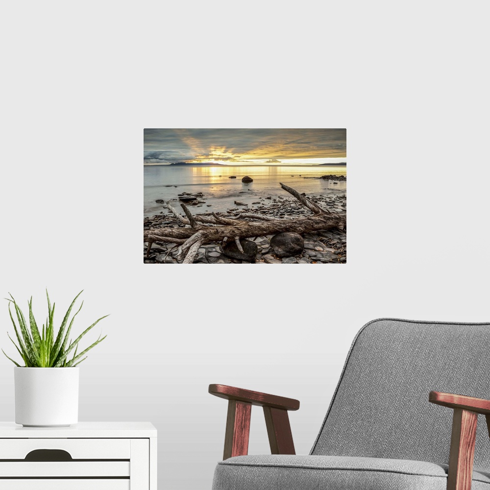 A modern room featuring The Sleeping Giant in Lake Superior at sunrise; Thunder Bay, Ontario, Canada